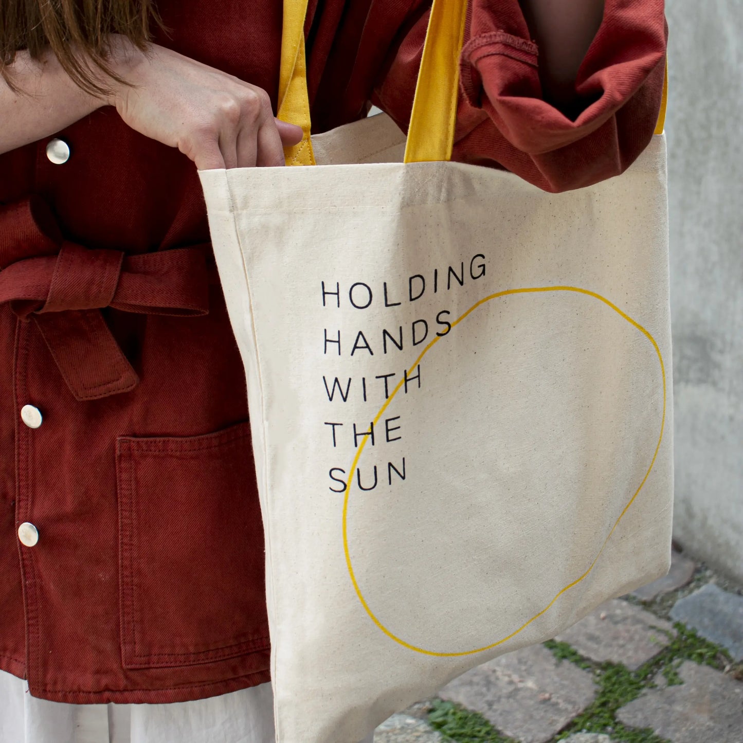 “Holding hands with the sun” Tote Bag